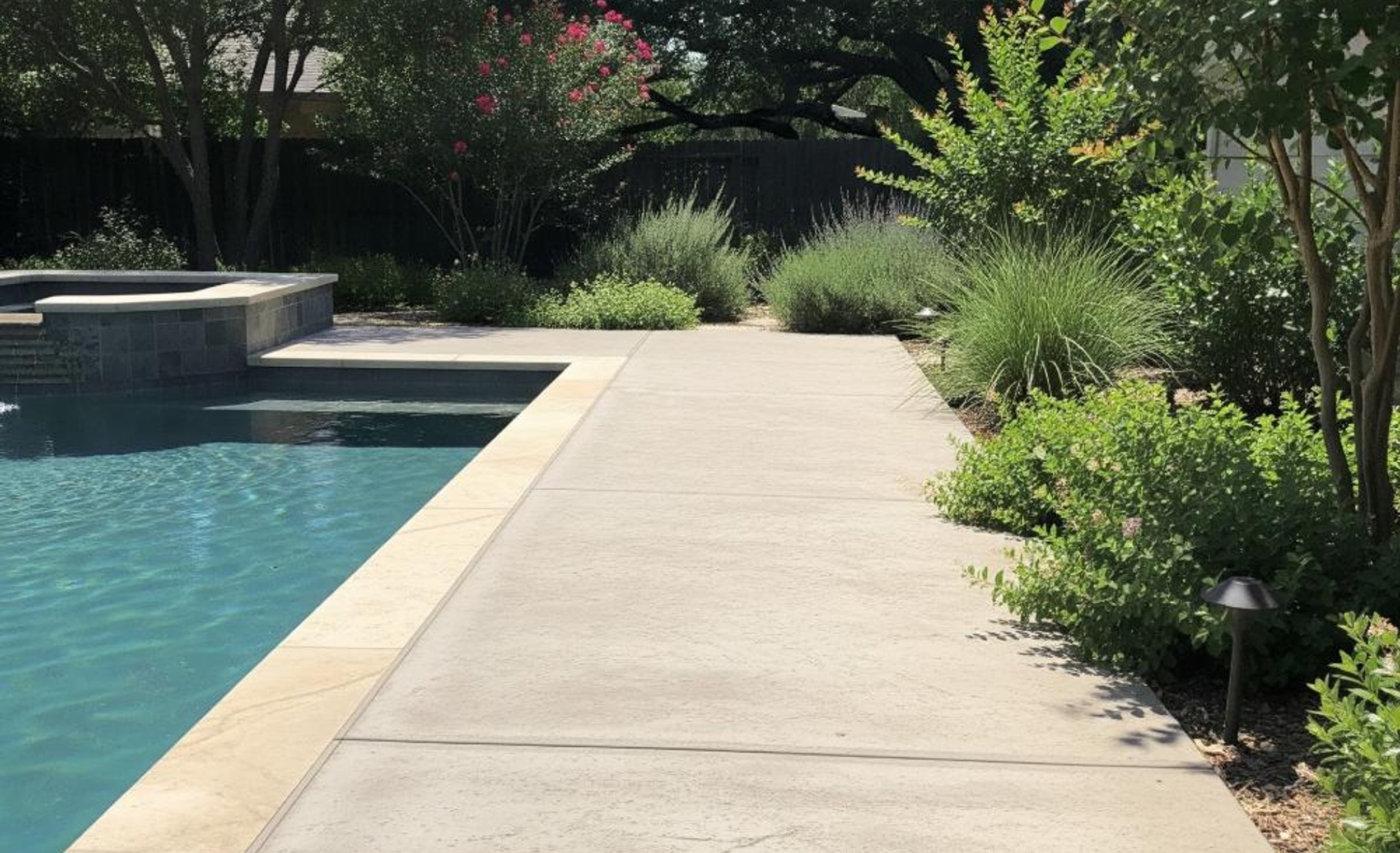 Concrete pool deck at an Austin home