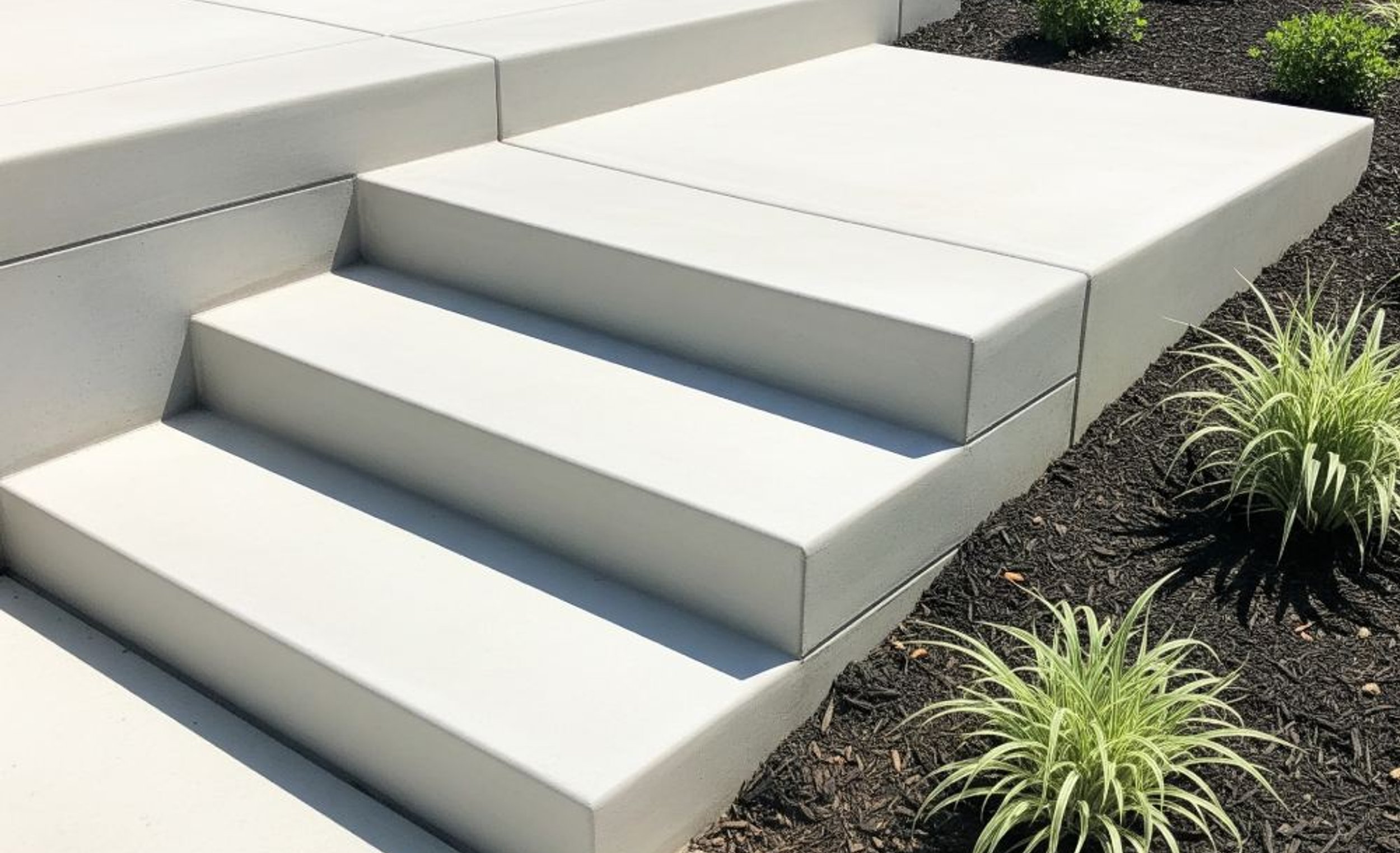 Poured concrete steps in an Austin yard