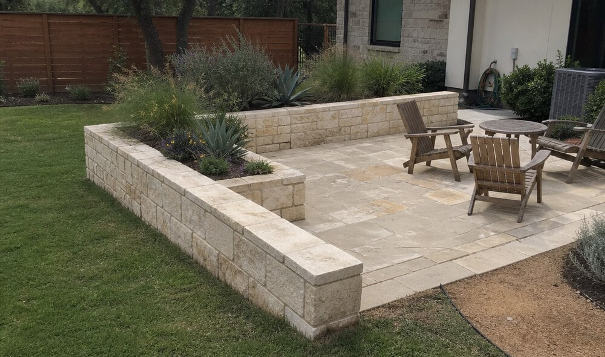 stone seating wall around an Austin patio