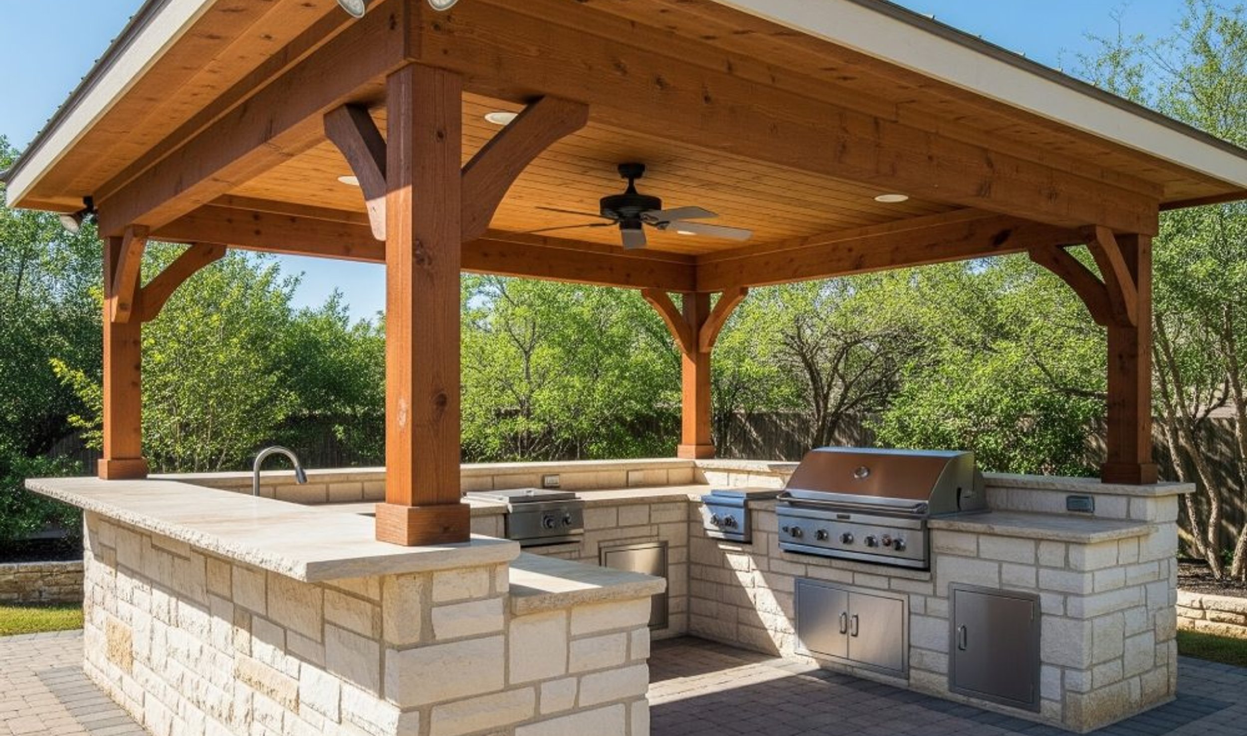 stone outdoor kitchen in an Austin backyard