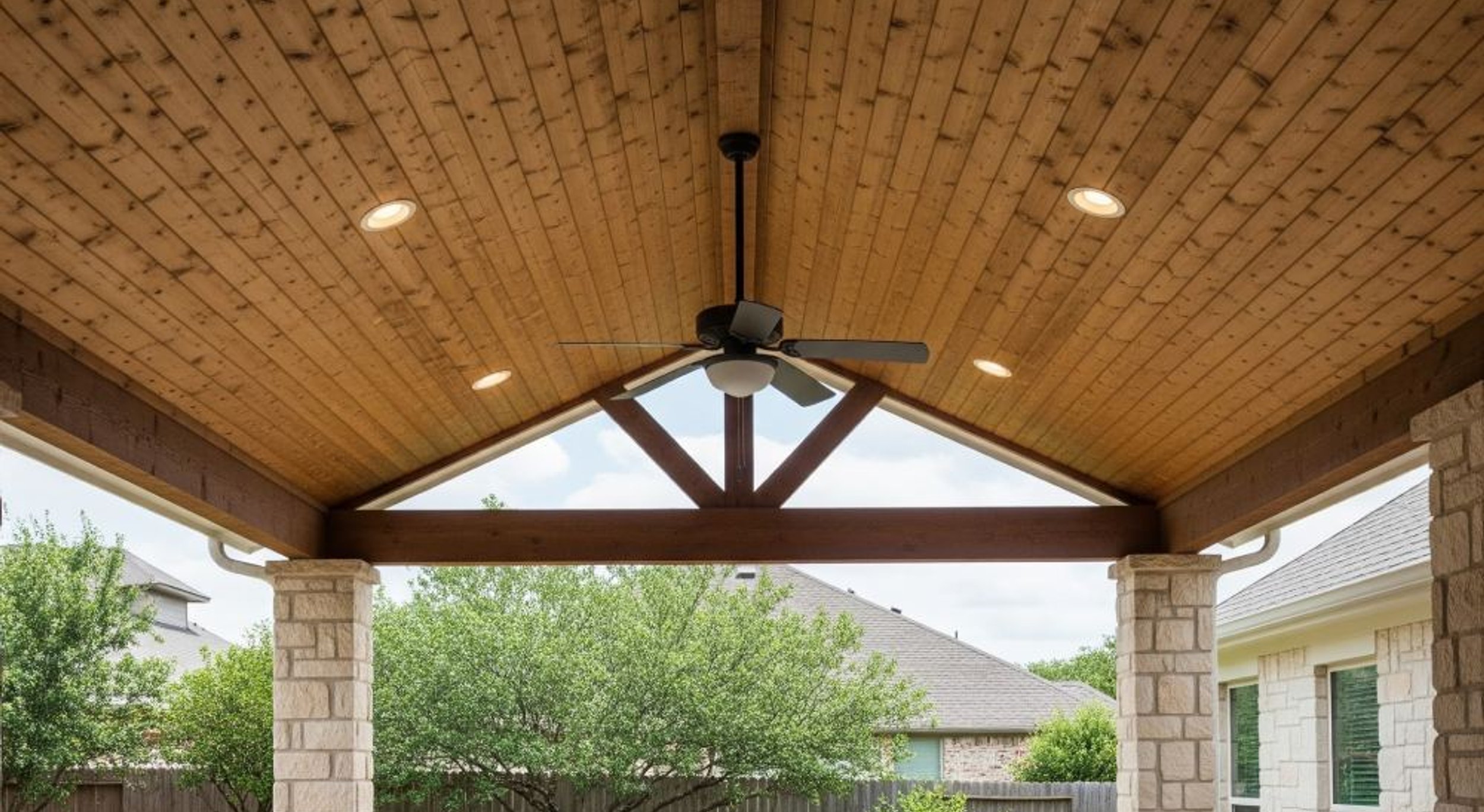 Outdoor ceiling fan and lighting on a covered Austin patio