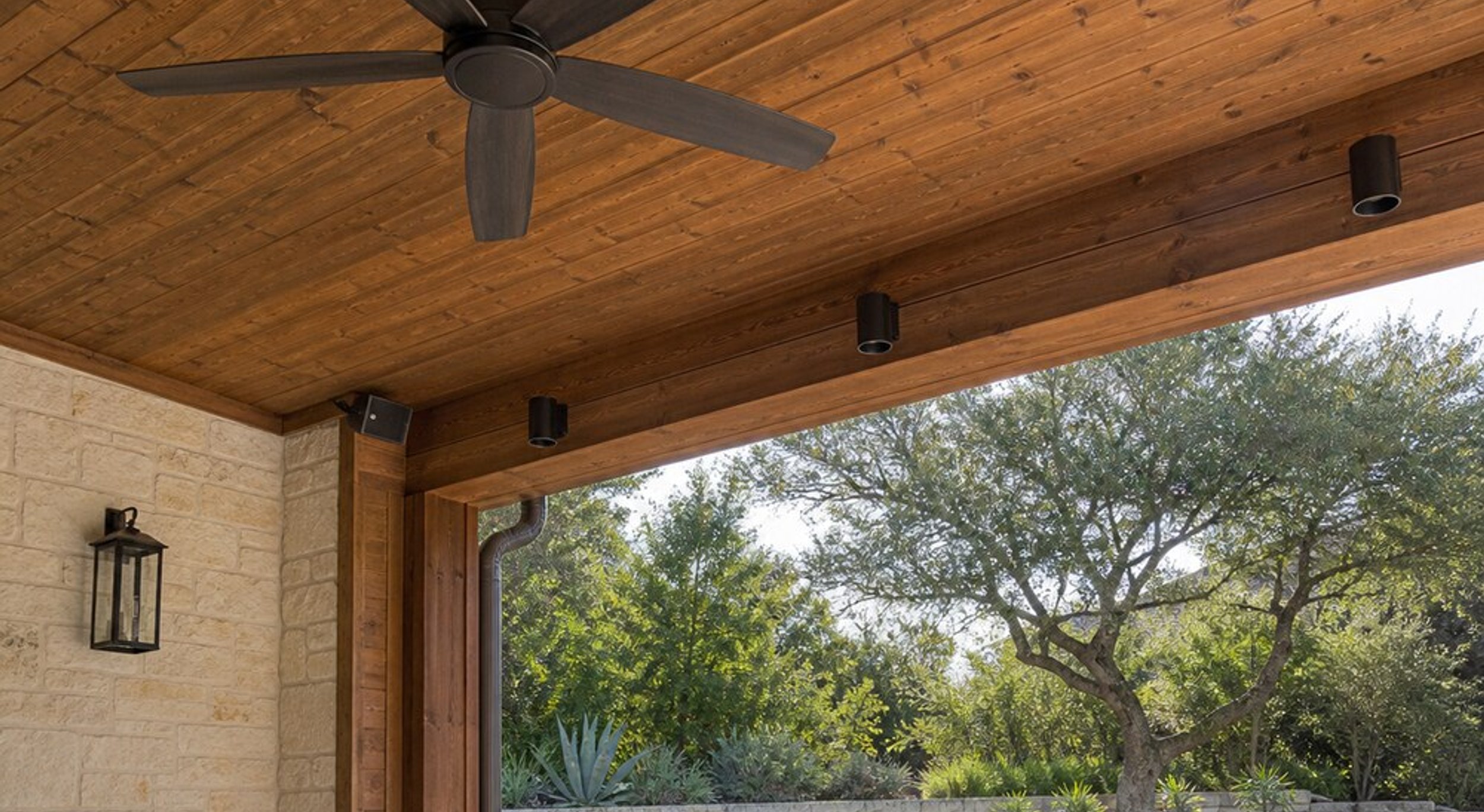 Outdoor ceiling fan and lighting on a covered Austin patio