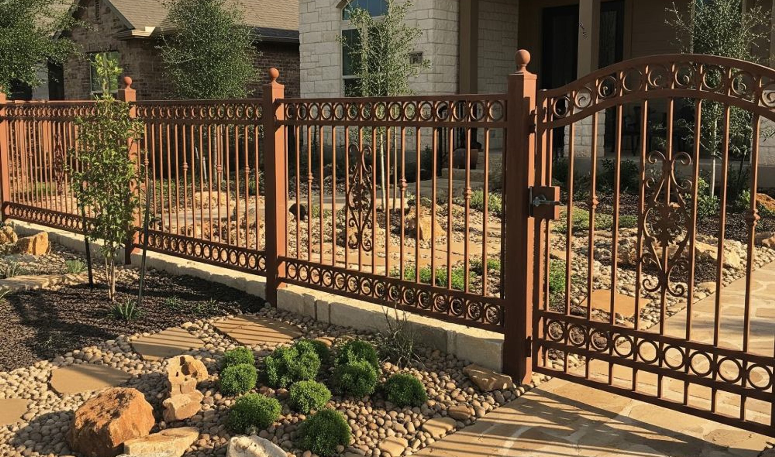 custom wrought iron fence at an Austin home