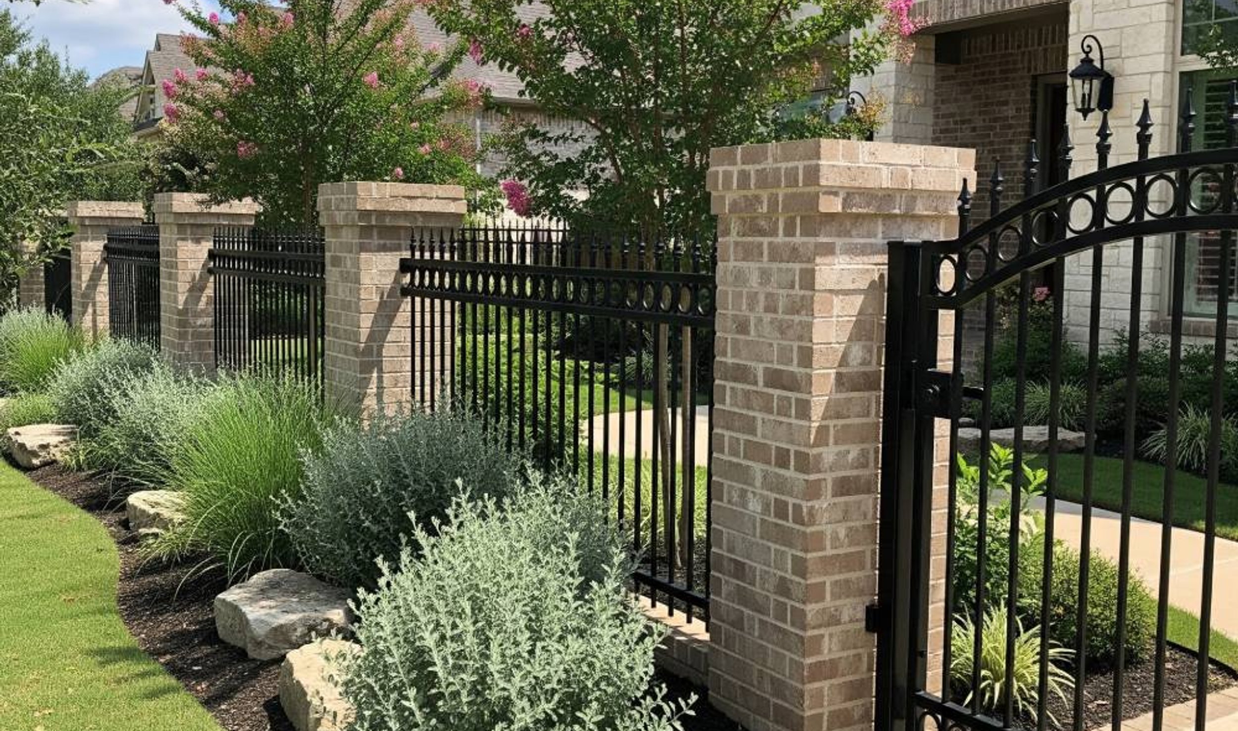 custom steel driveway gate at an Austin home