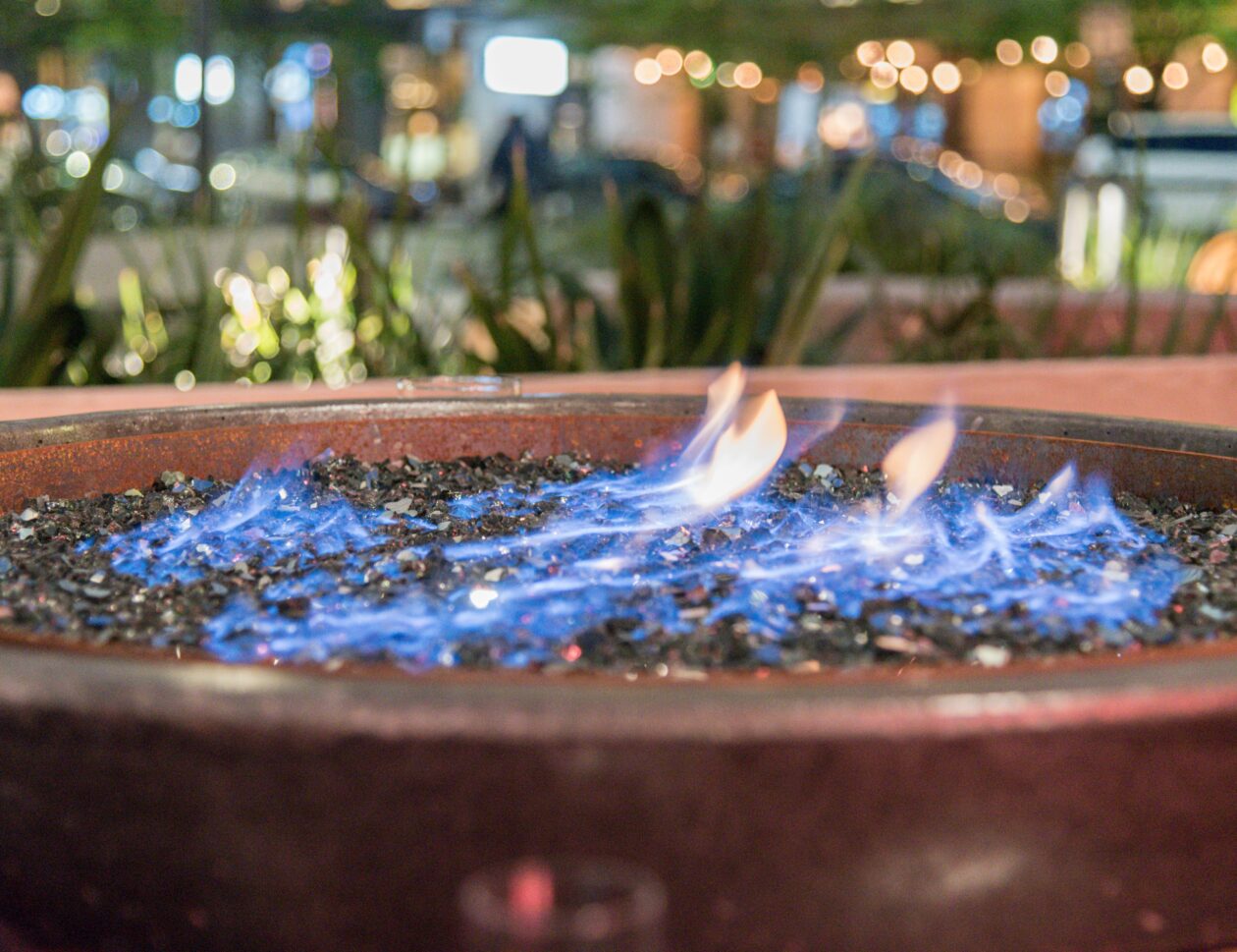 outdoor-patio-fire-pit-at-night-radiating-warmth-w-2023-11-27-05-01-32-utc